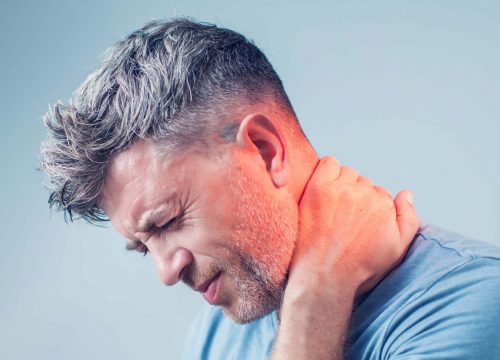 Man struggling with neck pain