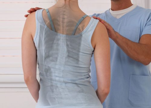 Nurse treating patient with scoliosis