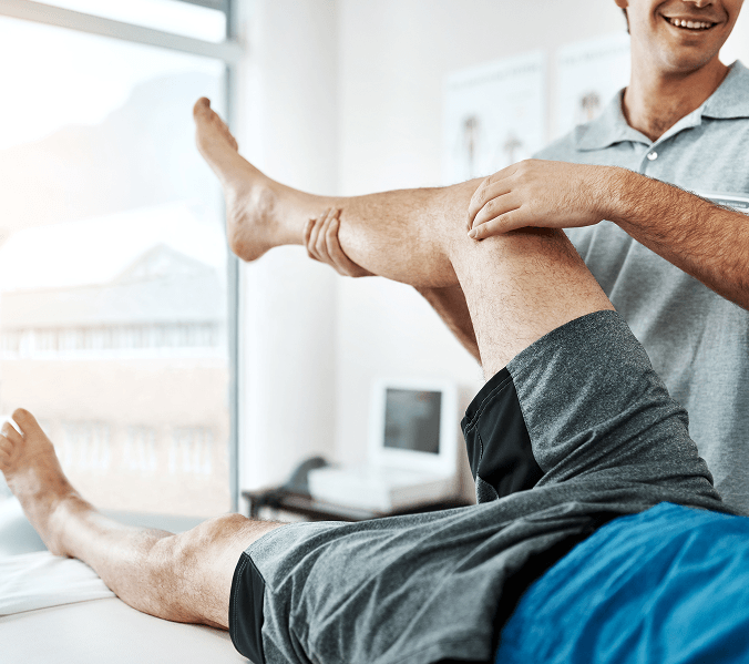 man-knee-injury-physiotherapist-working-consulting-room-rehabilitation-with-exercise-male-people-office-together-physiotherapy-service-with-health-insurance-joint-supp (1)