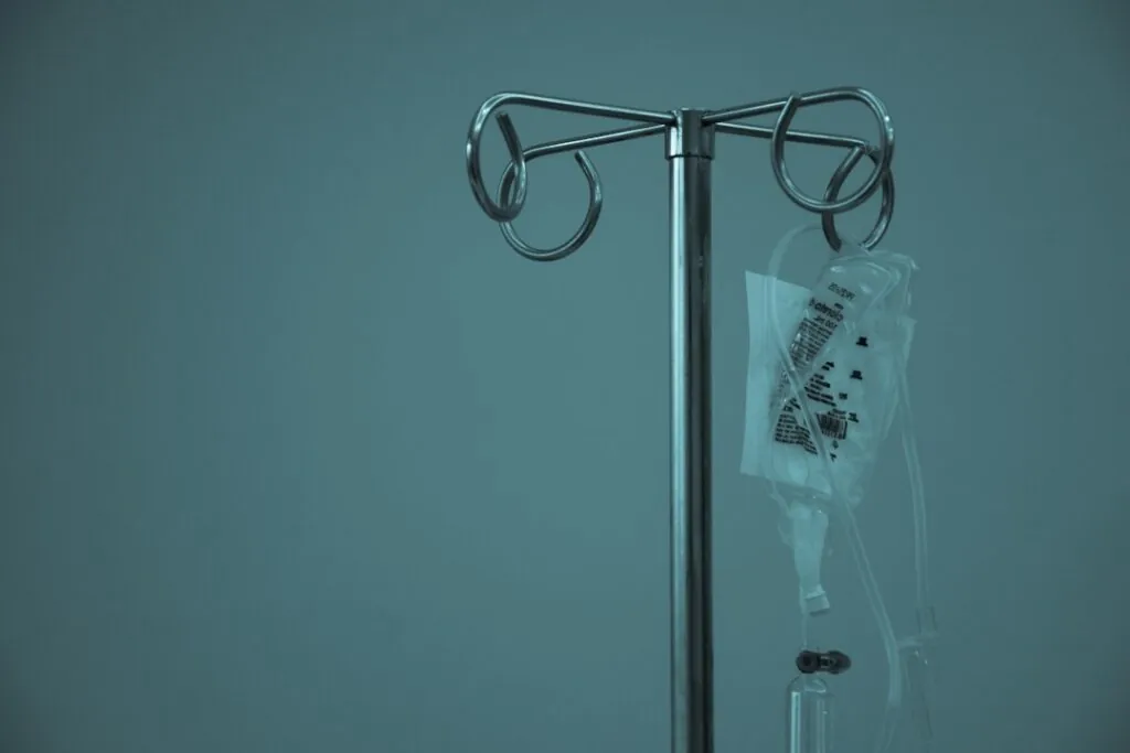 IV bag hanging on a metal drip stand